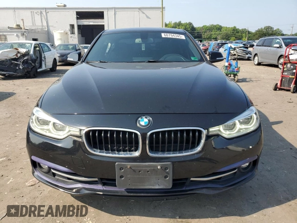 2018 BMW 3 Series 330i xDrive with VIN WBA8D9G56JNU69320, listed as a Copart auction lot 60794345 with 104,036 mi miles and Salvage title. Bid and sale history available at DreamBid. Image 5.
