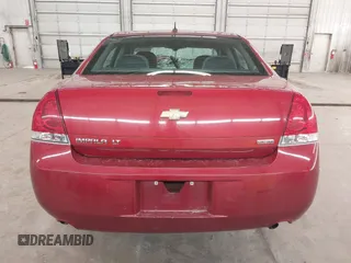 2014 Chevrolet Impala LT with VIN 2G1WB5E36E1133855, listed as a IAAI auction lot 41969358 with 148,897 mi miles and . Bid and sale history available at DreamBid. Image 17.
