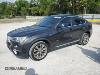 2017 BMW X4 xDrive28i with VIN 5UXXW3C36H0T79956, listed as a Copart auction lot 50156445 with 100,226 mi miles and Salvage Title. Bid and sale history available at carsss.com. Image 1.
