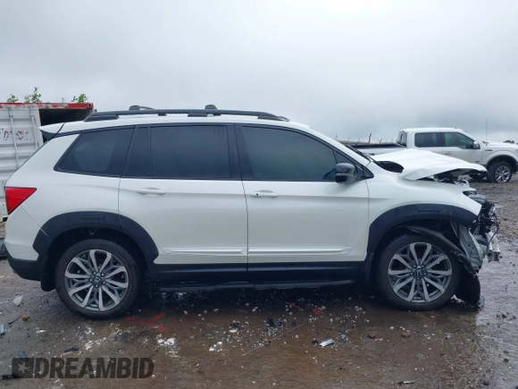 2019 Honda Passport Elite with VIN 5FNYF8H0XKB005151, listed as a IAAI auction lot 42322644 with 124,274 mi miles and . Bid and sale history available at DreamBid. Image 14.