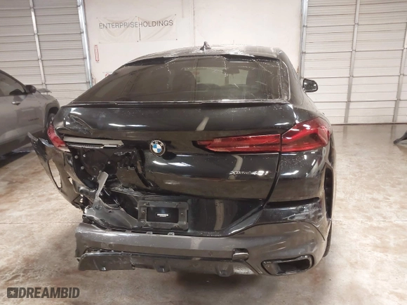 2021 BMW X6 xDrive40i with VIN 5UXCY6C03M9E61703, listed as a IAAI auction lot 41602401 with 1 mi miles. Bid and sale history available at carsss.com. Image 16.