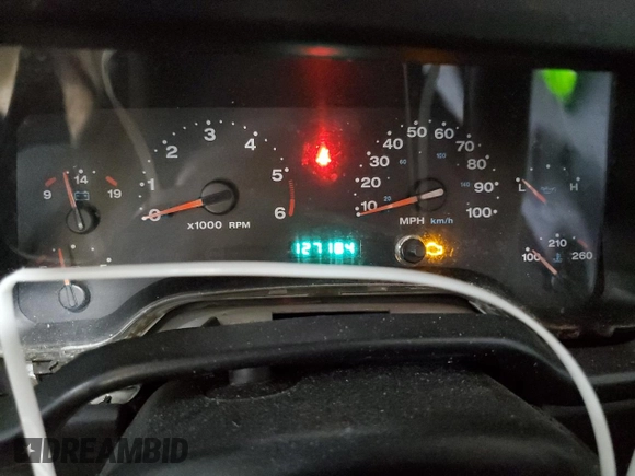 2006 Jeep Wrangler Sport z VIN 1J4FA49SX6P718734, wystawiony jako Copart lot #56516095 z przebiegiem 127 184 mil mil oraz Szkoda całkowita • Salvage title. Historia ofert i sprzedaży dostępna na DreamBid. Obrazek 9.