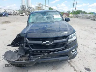2017 Chevrolet Colorado 4WD Z71 z VIN 1GCGTDENXH1223251, wystawiony jako IAAI lot #42205600 z przebiegiem 108 994 mil mil oraz . Historia ofert i sprzedaży dostępna na DreamBid. Obrazek 13.