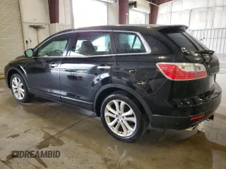 2011 Mazda CX-9 Grand Touring z VIN JM3TB3DV5B0303929, wystawiony jako Copart lot #59821825 z przebiegiem 149 663 mil mil oraz Szkoda całkowita • Salvage title. Historia ofert i sprzedaży dostępna na DreamBid. Obrazek 2.