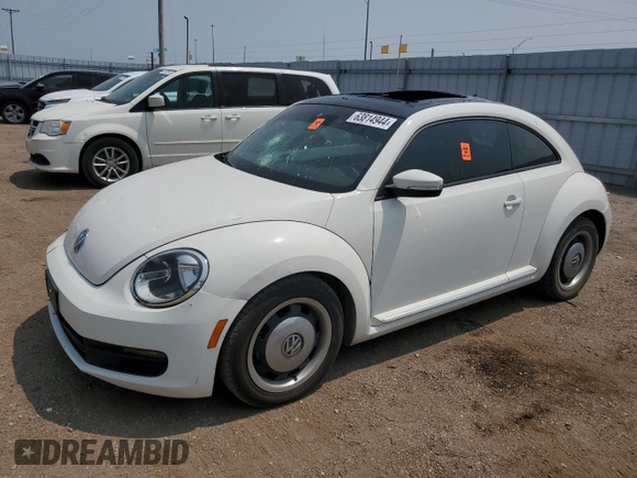 2013 Volkswagen Beetle with VIN 3VWHX7AT2DM656457, listed as a Copart auction lot 63814944 with 92,966 mi miles and Salvage Title. Bid and sale history available at DreamBid. Image 1.