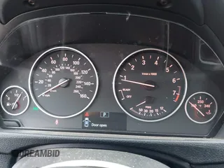2013 BMW 3 Series 320i with VIN WBA3B1C51DK129473, listed as a IAAI auction lot 41591999 with 80,389 mi miles. Bid and sale history available at carsss.com. Image 7.