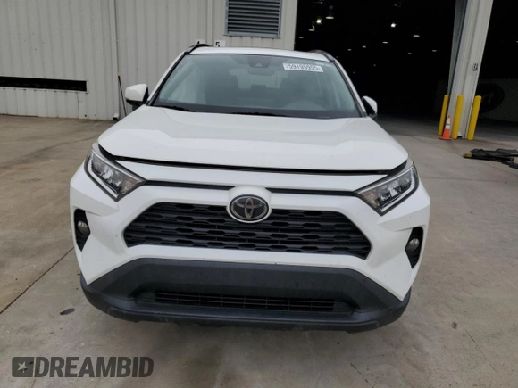 2019 Toyota RAV4 XLE with VIN 2T3P1RFV6KC060285, listed as a Copart auction lot 59195955 with 136,942 mi miles and Salvage title. Bid and sale history available at DreamBid. Image 5.