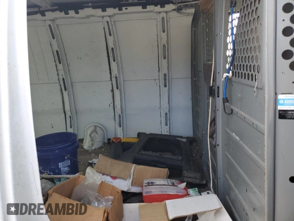 2017 Chevrolet Express Cargo Van with VIN 1GCWGBFG9H1338685, listed as a Copart auction lot 82253254 with 140,434 mi miles and Clean Title. Bid and sale history available at carsss.com. Image 11.