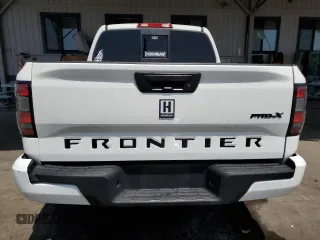 2022 Nissan Frontier SV with VIN 1N6ED1EJ6NN617301, listed as a Copart auction lot 60572395 with 77,269 mi miles and Salvage title. Bid and sale history available at DreamBid. Image 6.