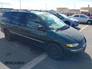 1999 Chrysler Town & Country LXi with VIN 1C4GP54L9XB629699, listed as a IAAI auction lot 41484033 with 95,043 mi miles. Bid and sale history available at carsss.com. Image 1.