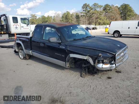 2001 Dodge Dakota SLT with VIN 1B7GG22X41S309217, listed as a Copart auction lot 44257285 with 153,872 mi miles and Salvage Title. Bid and sale history available at carsss.com. Image 4.