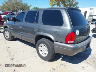2001 Dodge Durango z VIN 1B4HR28Z11F613523, wystawiony jako IAAI lot #41703743 z przebiegiem 142 828 mil mil oraz . Historia ofert i sprzedaży dostępna na DreamBid. Obrazek 3.