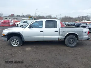 2003 Dodge Dakota Sport with VIN 1D7HG38X13S267227, listed as a IAAI auction lot 41952281 with 119,641 mi miles and . Bid and sale history available at carsss.com. Image 14.