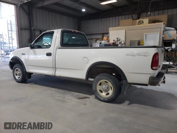 2000 Ford F-150 XL with VIN 1FTZF182XYNC09505, listed as a Copart auction lot 73420184 with 296,202 mi miles and Salvage title. Bid and sale history available at DreamBid. Image 2.