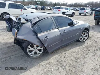 2009 Mazda 3 S Grand Touring z VIN JM1BK324591200710, wystawiony jako IAAI lot #41833613 z przebiegiem 131 459 mil mil oraz . Historia ofert i sprzedaży dostępna na DreamBid. Obrazek 4.