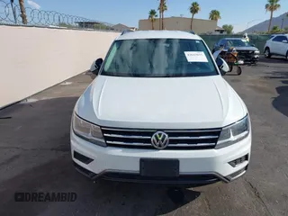2020 Volkswagen Tiguan S with VIN 3VV1B7AXXLM036994, listed as a IAAI auction lot 42643035 with 62,676 mi miles and . Bid and sale history available at DreamBid. Image 6.