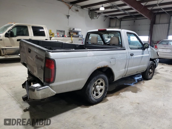 2000 Nissan Frontier XE z VIN 1N6DD21S1YC392012, wystawiony jako Copart lot #41843855 z przebiegiem 208 449 mil mil oraz Szkoda całkowita • Salvage title. Historia ofert i sprzedaży dostępna na DreamBid. Obrazek 3.