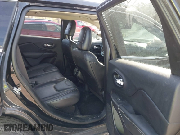 2016 Jeep Cherokee Limited z VIN 1C4PJLDB3GW256861, wystawiony jako IAAI lot #41829361 z przebiegiem 153 838 mil mil oraz . Historia ofert i sprzedaży dostępna na DreamBid. Obrazek 8.