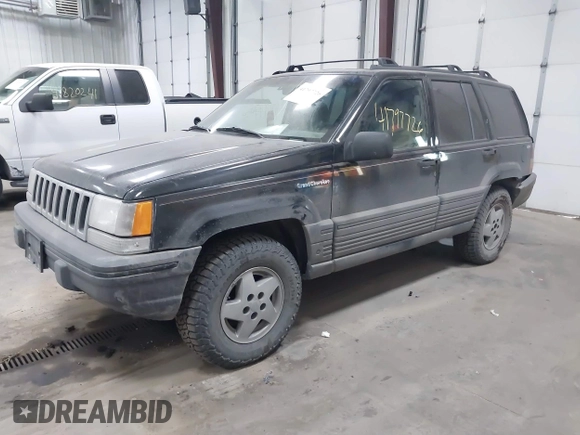 1995 Jeep Grand Cherokee Laredo with VIN 1J4GZ58S6SC765863, listed as a IAAI auction lot 41797726 with 234,715 mi miles and . Bid and sale history available at DreamBid. Image 2.