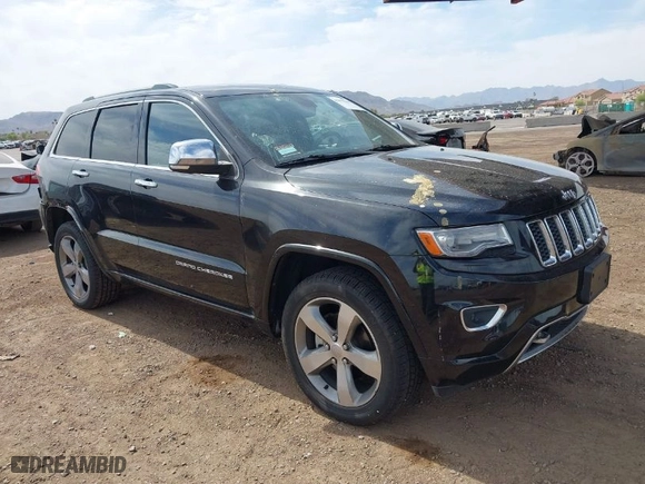 2014 Jeep Grand Cherokee Overland with VIN 1C4RJFCG4EC273786, listed as a IAAI auction lot 41901304 with 73,055 mi miles. Bid and sale history available at carsss.com. Image 1.