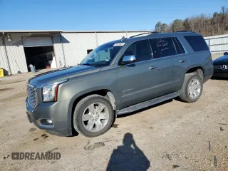 2018 GMC Yukon Denali with VIN 1GKS2CKJ6JR149752, listed as a Copart auction lot 82624404 with 137,640 mi miles and Salvage Title. Bid and sale history available at carsss.com. Image 1.