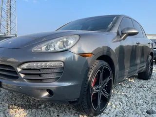 2011 Porsche Cayenne S with VIN WP1AB2A22BLA47332, listed as a Copart auction lot 65087385 with 112,033 mi miles and Salvage title. Bid and sale history available at DreamBid. Image 2.