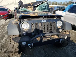 2015 Jeep Wrangler Willys Wheeler with VIN 1C4AJWAG8FL648645, listed as a Copart auction lot 74334884 with Not provided miles and Salvage title. Bid and sale history available at DreamBid. Image 5.