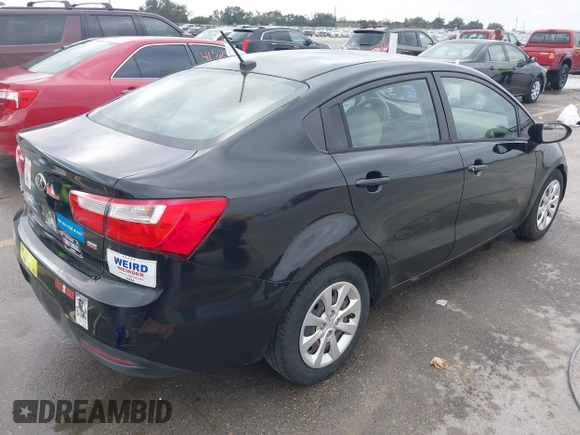 2015 Kia Rio LX with VIN KNADM4A39F6440291, listed as a IAAI auction lot 41532881 with 97,238 mi miles. Bid and sale history available at carsss.com. Image 4.