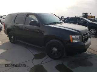 2013 Chevrolet Tahoe Commercial with VIN 1GNLC2E00DR304026, listed as a Copart auction lot 57041135 with 125,087 mi miles and Salvage title. Bid and sale history available at DreamBid. Image 4.
