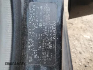 2005 Kia Spectra with VIN KNAFE161255088283, listed as a Copart auction lot 73654744 with 169,947 mi miles and Salvage Title. Bid and sale history available at carsss.com. Image 12.