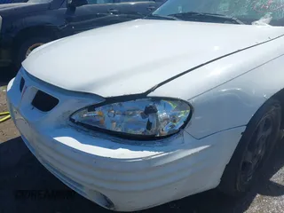 2000 Pontiac Grand Am SE1 with VIN 1G2NF52T0YC509612, listed as a IAAI auction lot 41705491 with 264,125 mi miles. Bid and sale history available at carsss.com. Image 6.