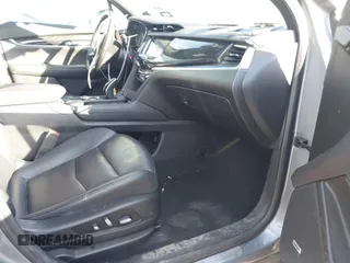 2020 Cadillac XT6 FWD Premium Luxury z VIN 1GYKPCRS8LZ129799, wystawiony jako IAAI lot #41602536 z przebiegiem 96 865 mil mil oraz . Historia ofert i sprzedaży dostępna na DreamBid. Obrazek 5.