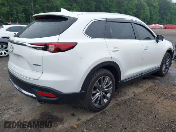 2021 Mazda CX-9 Signature with VIN JM3TCBEY4M0517118, listed as a IAAI auction lot 42400675 with 56,260 mi miles and . Bid and sale history available at DreamBid. Image 4.