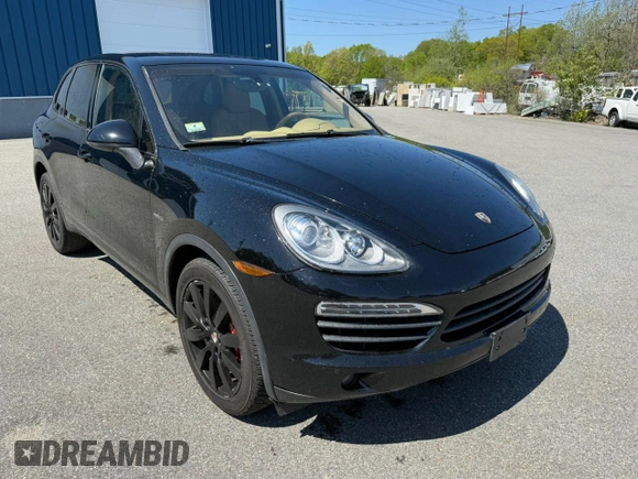 2012 Porsche Cayenne S Hybrid z VIN WP1AE2A28CLA94048, wystawiony jako Copart lot #56879555 z przebiegiem 129 448 mil mil oraz Tytuł czysty. Historia ofert i sprzedaży dostępna na DreamBid. Obrazek 1.