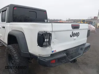 2020 Jeep Gladiator Sport S z VIN 1C6HJTAG0LL129461, wystawiony jako IAAI lot #41464713 z przebiegiem 66 625 mil mil oraz . Historia ofert i sprzedaży dostępna na DreamBid. Obrazek 18.