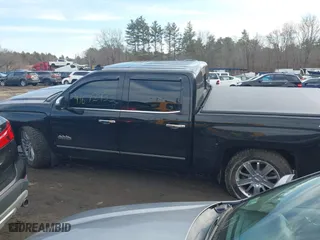 2015 Chevrolet Silverado 1500 High Country with VIN 3GCUKTEC3FG506216, listed as a IAAI auction lot 41672433 with 77,653 mi miles. Bid and sale history available at carsss.com. Image 14.