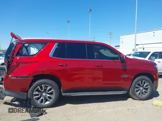 2021 Chevrolet Tahoe LT z VIN 1GNSCNKD1MR316397, wystawiony jako IAAI lot #41805199 z przebiegiem 41 028 mil mil oraz . Historia ofert i sprzedaży dostępna na DreamBid. Obrazek 13.