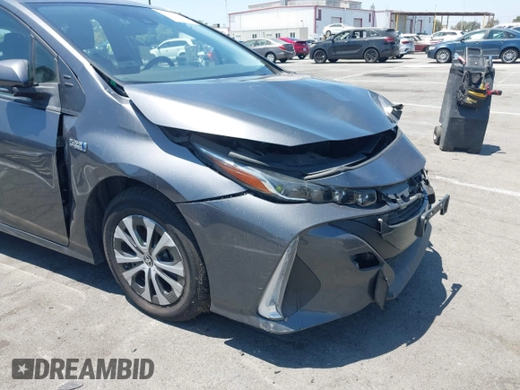 2021 Toyota Prius LE with VIN JTDKAMFPXM3170372, listed as a IAAI auction lot 42661609 with 47,977 mi miles and . Bid and sale history available at DreamBid. Image 17.