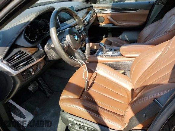 2015 BMW X6 xDrive50i with VIN 5UXKU6C50F0F94199, listed as a Copart auction lot 70680312 with 106,650 mi miles. Bid and sale history available at carsss.com. Image 7.