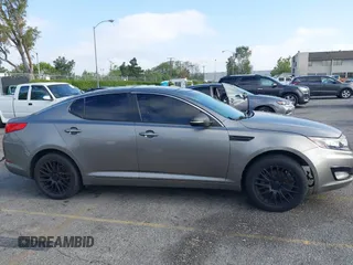 2013 Kia Optima EX with VIN 5XXGN4A7XDG106303, listed as a IAAI auction lot 42209976 with Not provided miles and . Bid and sale history available at DreamBid. Image 14.