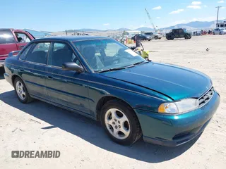 1999 Subaru Legacy L 30th Anniversary with VIN 4S3BD435XX7255817, listed as a IAAI auction lot 42792731 with 31,831 mi miles and . Bid and sale history available at DreamBid. Image 1.