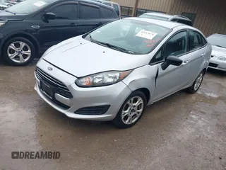 2015 Ford Fiesta SE with VIN 3FADP4BJ4FM204354, listed as a IAAI auction lot 42117676 with 146,110 mi miles and . Bid and sale history available at DreamBid. Image 2.