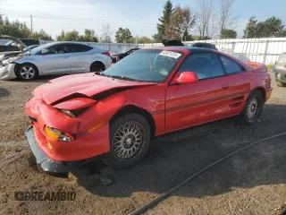 1993 Toyota MR2 z VIN JT2SW22P2P0063195, wystawiony jako Copart lot #68921224 z przebiegiem 155 528 mil mil oraz Czysty tytuł • Clean title. Historia ofert i sprzedaży dostępna na DreamBid. Obrazek 1.