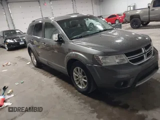2013 Dodge Journey SXT with VIN 3C4PDDBG4DT600078, listed as a IAAI auction lot 42060076 with 167,943 mi miles and . Bid and sale history available at DreamBid. Image 1.