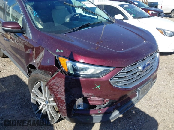 2019 Ford Edge Titanium z VIN 2FMPK3K94KBB41673, wystawiony jako IAAI lot #41762692 z przebiegiem 82 812 mil mil oraz . Historia ofert i sprzedaży dostępna na DreamBid. Obrazek 6.