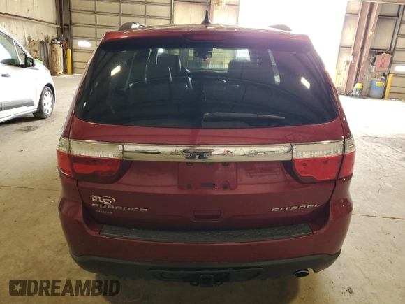 2013 Dodge Durango Citadel z VIN 1C4RDJEG9DC655575, wystawiony jako Copart lot #54382115 z przebiegiem 166 453 mil mil oraz Szkoda całkowita • Salvage title. Historia ofert i sprzedaży dostępna na DreamBid. Obrazek 6.