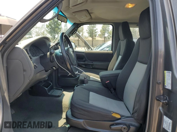 2005 Ford Ranger XL with VIN 1FTZR15E45PA73118, listed as a Copart auction lot 64683135 with 162,514 mi miles and Salvage title. Bid and sale history available at DreamBid. Image 7.