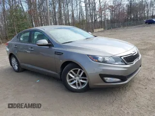 2013 Kia Optima LX with VIN 5XXGM4A79DG135066, listed as a IAAI auction lot 41915458 with 126,759 mi miles. Bid and sale history available at carsss.com. Image 1.
