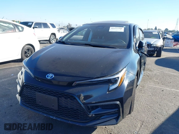 2023 Toyota Corolla Hybrid LE with VIN JTDBCMFE6P3001785, listed as a IAAI auction lot 41337266 with 25,829 mi miles. Bid and sale history available at carsss.com. Image 17.