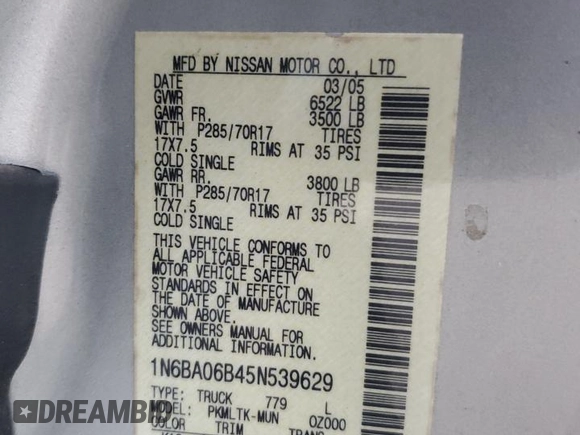 2005 Nissan Titan SE with VIN 1N6BA06B45N539629, listed as a Copart auction lot 82527074 with 154,255 mi miles and Salvage title. Bid and sale history available at DreamBid. Image 14.